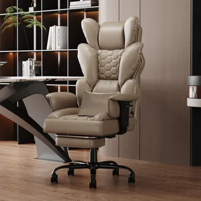 A khaki ergonomic office chair is shown in a modern office setting, next to a desk and bookshelf.