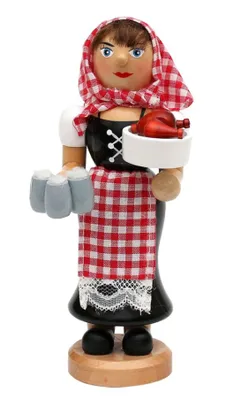 Kellnerin trägt Dirndl aus einem schwarzen Mieder mit Schnürung, weißer Bluse und roter Schürze.