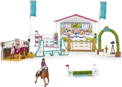 A toy playset depicting a horse show event with various accessories.