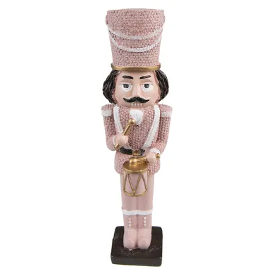 Zdjęcie produktu dla Dekoracyjna figurka orzechopęka wykonana z polirezyny, o strukturze przypominającej glinę, wysokość 16 cm, kolor różowy, marka Clayre & Eef, model 6PR3676