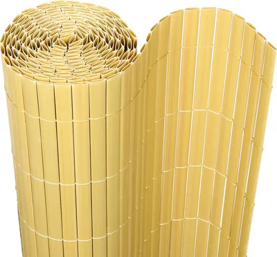 A rolled-up privacy screen made of bamboo-like material.