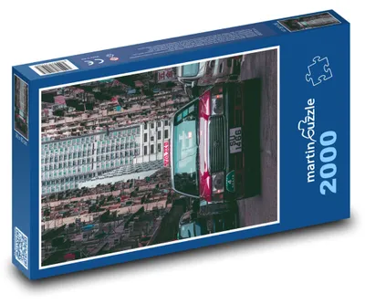 Produktbild von Puzzle 2000 Rotes Taxi auf der Straße - martinpuzzle