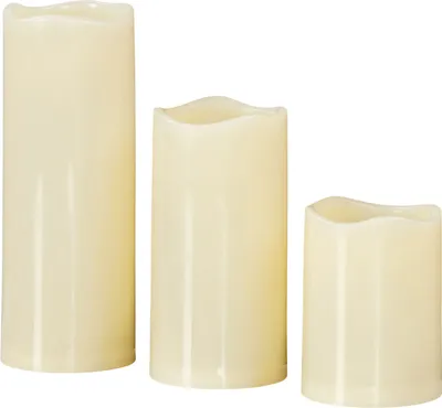 Three LED candles of varying heights are arranged in a row against a white background.