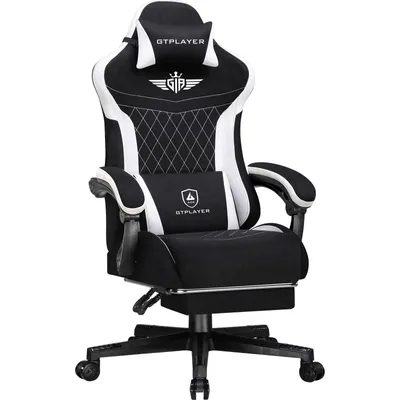 A black and white gaming chair with a headrest and lumbar support.
