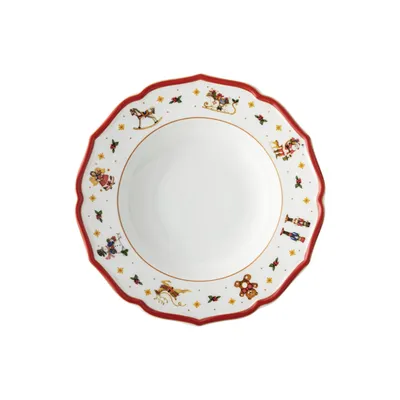 A deep plate with a festive Christmas-themed rim.