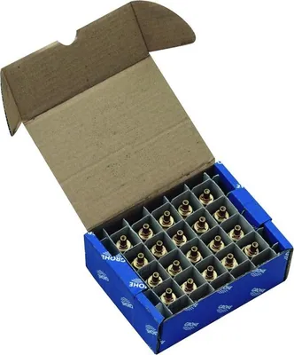 A box of plumbing parts, likely valves or fittings, arranged in compartments.