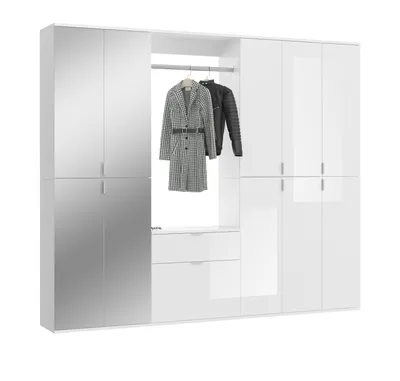 A white high-gloss wardrobe with mirrored doors and hanging coats.