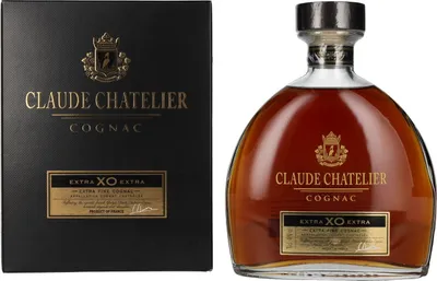 A bottle of Claude Chatelier Extra XO Extra Fine Cognac and its gift box.