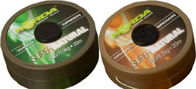 Two spools of fishing line, one green and one brown, shown side-by-side against a white background.