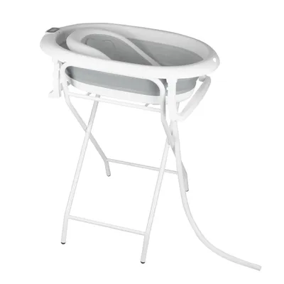 A baby bathtub with a stand and a drain hose, shown against a white background.
