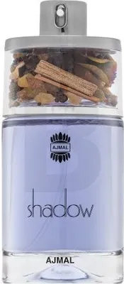 A perfume bottle with spices in the cap.