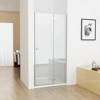 A modern bathroom with a glass shower enclosure.