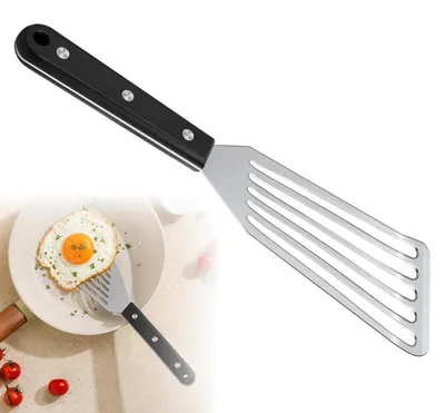 Image de Spatule en acier inoxydable, 32 cm, idéale pour les poissons, les œufs et les grillades. Lavable au lave-vaisselle