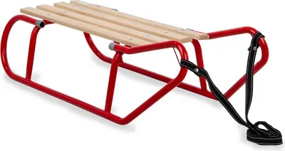 A red metal sled with wooden slats and a black pull rope, shown from a side-angle on a white background.