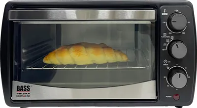A toaster oven with a croissant inside.