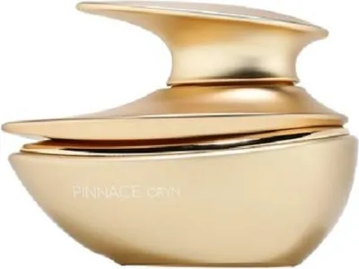 A gold-colored perfume bottle with a unique, sculptural design.