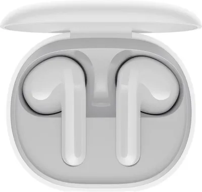 A pair of white wireless earbuds in their charging case.