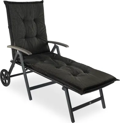 A studio shot of a dark gray chaise lounge with a thick cushion, shown from a three-quarter angle against a white background.