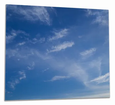 Produktbild von Wallario Herdabdeckplatte aus Glas, Größe 60 x 52 cm 1-teilig, Motiv Blauer Himmel mit vereinzelten Wolken