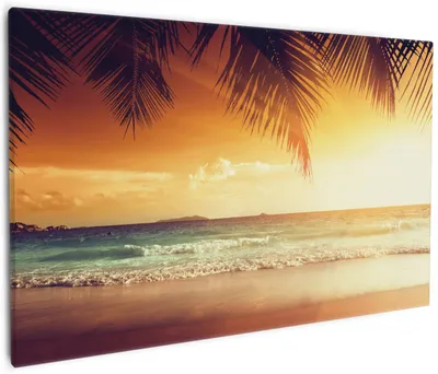 Produktbild von Wallario Premium Leinwandbild Sonnenuntergang am Strand in der Karibik in Größe 60 x 90 cm