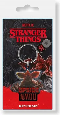 A keychain product in its packaging, featuring characters and branding from Stranger Things.