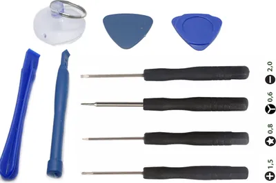 A set of electronic repair tools laid out on a white background.
