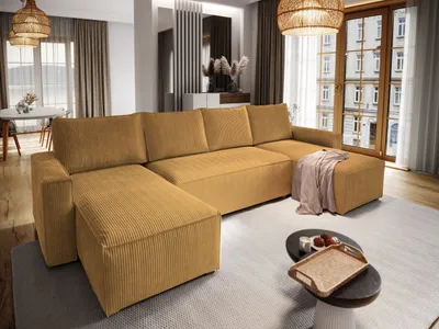 A modern living room with a large sectional sofa.