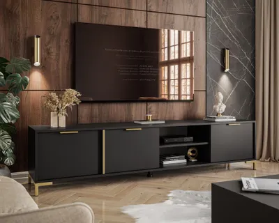 A modern living room with a TV stand and television.
