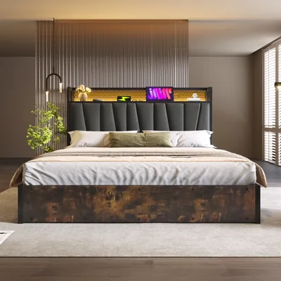 A bedroom scene featuring a bed with a headboard and integrated lighting.