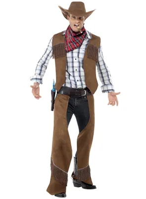 A man dressed in a cowboy costume, standing and posing.