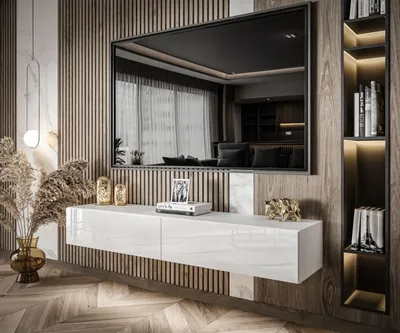A modern living room with a wall-mounted TV and entertainment unit.