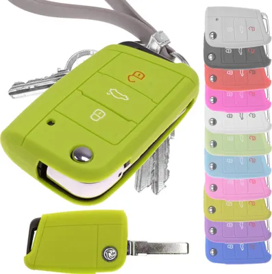 A collage of car key covers in various colors, with a focus on a green one.