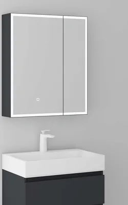 A bathroom cabinet with LED lighting and a sink.