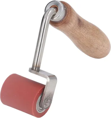 Produktbild von Nahtroller aus Silikon, ca. 4,3 cm breit, 75° verschleißfest, langlebig, doppelt gelagert, ergonomischer Griff