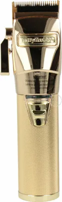 Imagen del producto de Máquina de cortar pelo inalámbrica BaBylissPRO GOLDFX, color dorado
