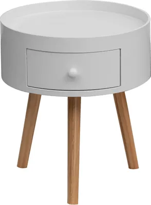 A white round bedside table with a drawer and three wooden legs, isolated on a white background.