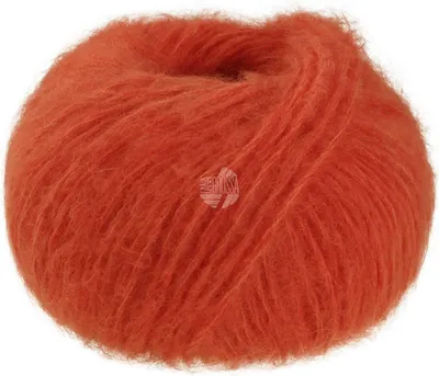 A ball of fluffy, orange yarn.