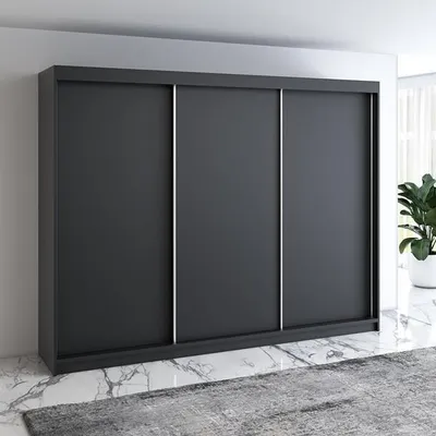 A modern, dark gray sliding door wardrobe is shown in a room with marble flooring and a rug.