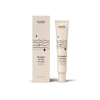 A product shot of a facial cream and its packaging.