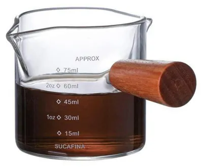 Immagine prodotto di Bicchiere in vetro borosilicato con scala graduata da 75 ml, resistente al calore e con manico