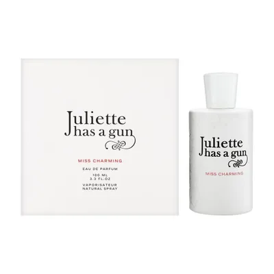 A perfume bottle and its box are displayed side-by-side on a white background.