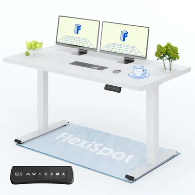 A white adjustable standing desk with dual monitors, keyboard, mouse, and a mat on the floor.
