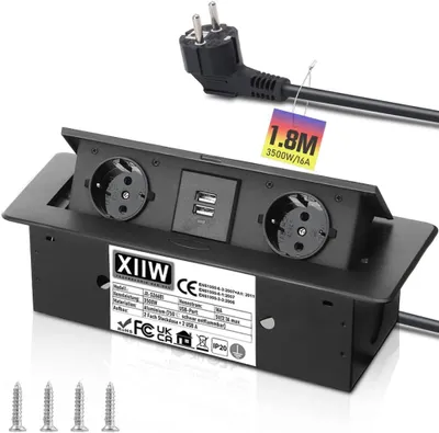 A black recessed power strip with two outlets and two USB ports, shown partially installed, with a power plug and screws in the foreground.