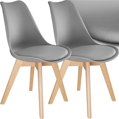 Two gray chairs with wooden legs are shown against a white background.