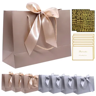 Immagine prodotto di Sacchetti regalo di carta con biglietti di auguri