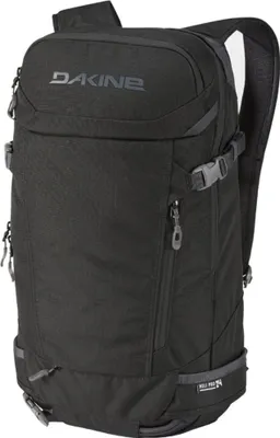 A black Dakine backpack is shown against a white background.
