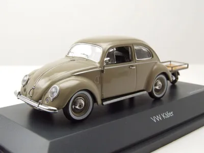 Zdjęcie produktu dla VW Beetle Pretzel Beetle z przyczepą Car Porter beżowy model samochodu 1:43 Schuco