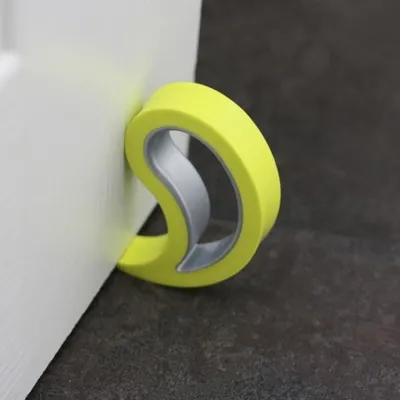Produktbild von ExtraSign Tür- und Fensterstopper, Pistazie, TPE/PP, ca. 9,5 x 5,5 cm. Hält bei starkem Durchzug, schützt & spart Energie beim Stoßlüften. Für 1-9 cm Spalthöhe. Für Türen, Balkontüren, Fenster auf Fliesen, Marmor, Teppich, Holz, Alu, Kunststoff.