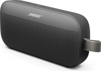 A dark gray Bose SoundLink Flex speaker is shown from a three-quarter angle against a white background.