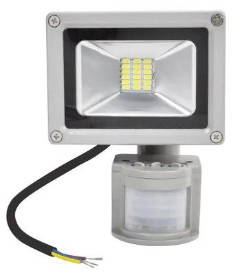 A close-up studio shot of an LED floodlight with a motion sensor.